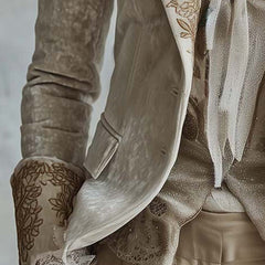 Ivory tailored blazer with gold-toned floral embroidery on the lapels and cuffs