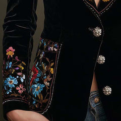 Black single-breasted blazer with colourful floral embroidery on the lapels, cuffs and pockets