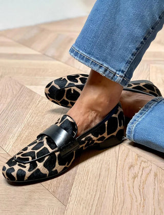 Animal print slip-on loafer with black strap detailing