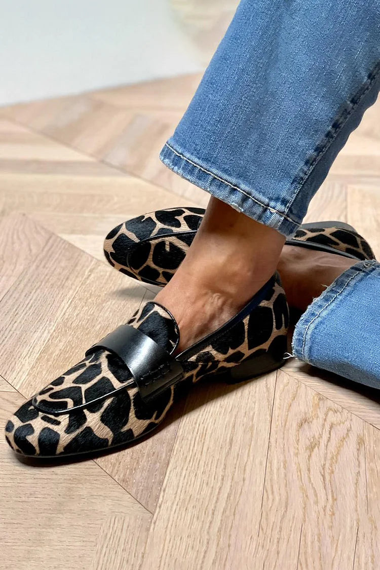Animal print slip-on loafer with black strap detailing