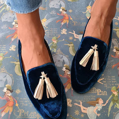 Midnight-blue velvet loafers with light champagne tassels