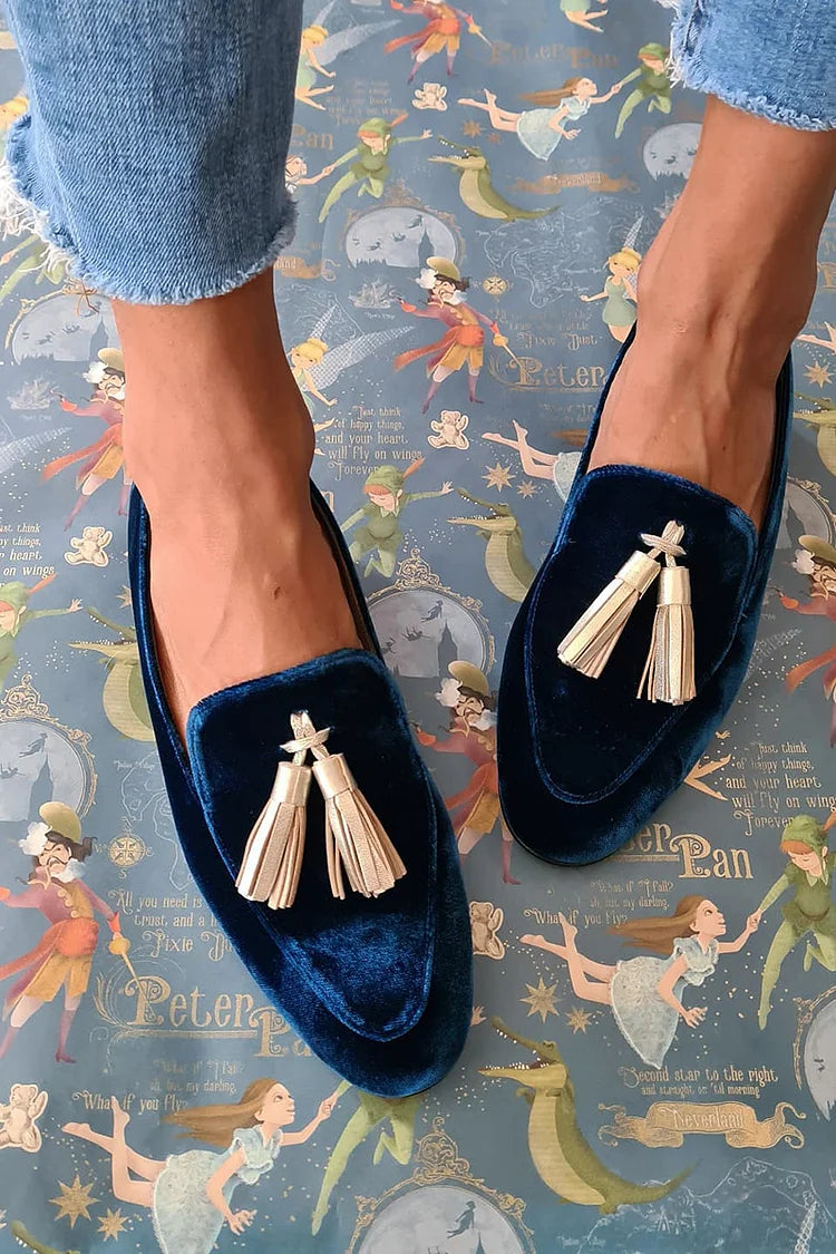 Midnight-blue velvet loafers with light champagne tassels