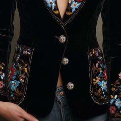 Black single-breasted blazer with colourful floral embroidery on the lapels, cuffs and pockets