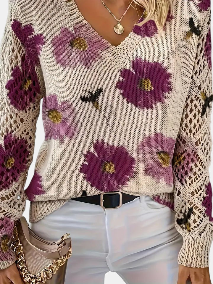 Women's floral knit V-neck sweater with open-knit sleeves and ribbed cuffs and hem