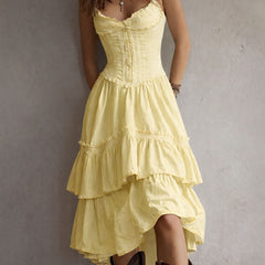 Boho corset midi dress with tiered skirt and delicate lace trim at the neckline