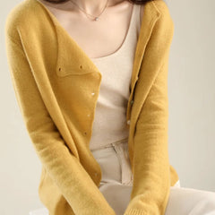 Women's V-neck button-front long sleeve cardigan with softly shaped collar and hip-length hem