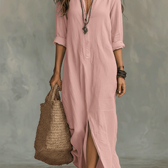 Woman wearing a black button-front bohemian shirt maxi dress with a flowy silhouette