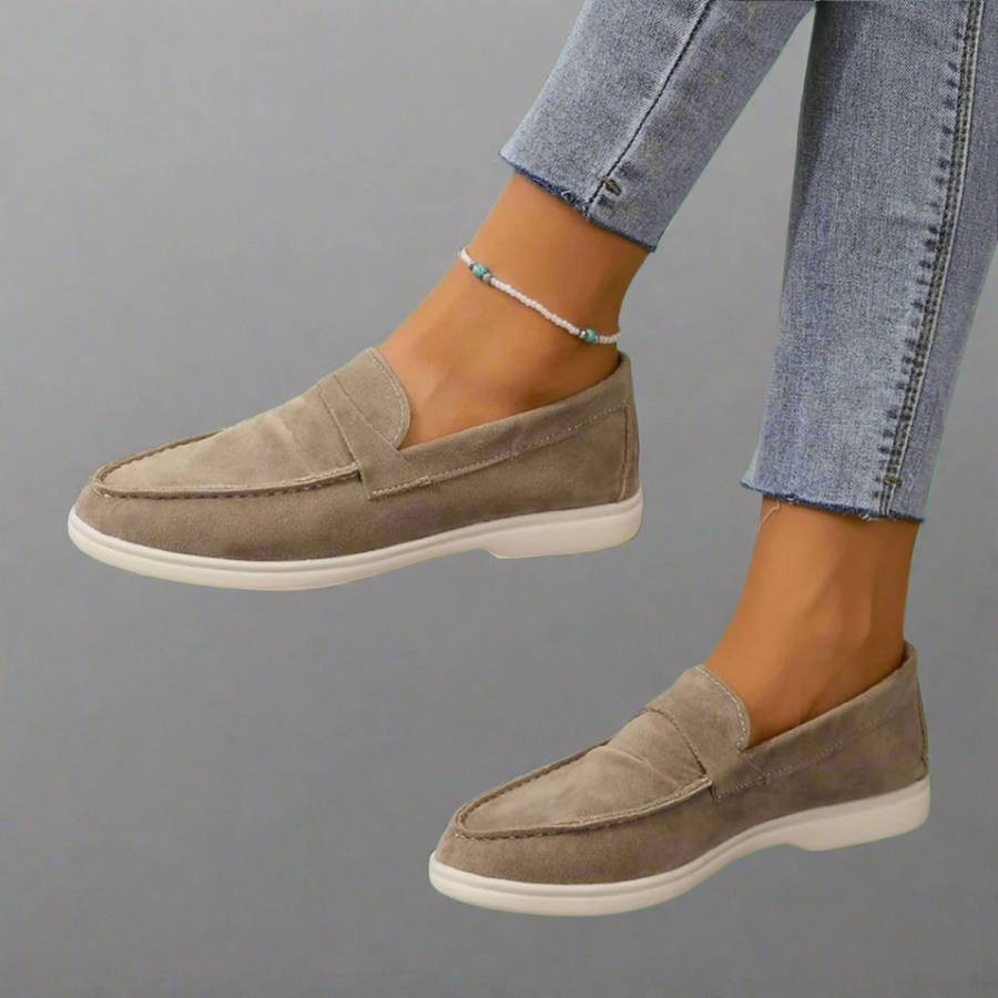 Classic slip-on loafers with smooth finish and streamlined silhouette