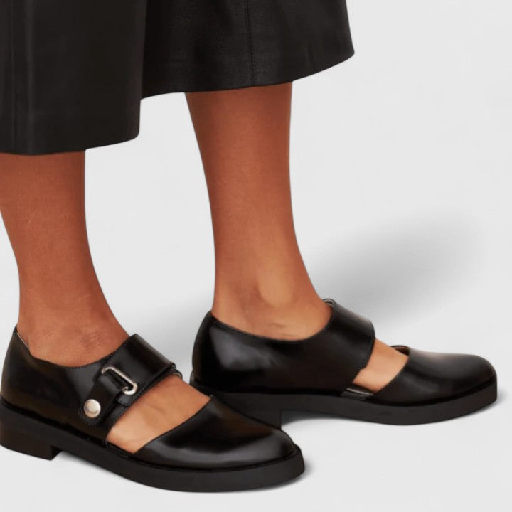 Elegant black heeled shoes named Darcy with a sleek, refined silhouette