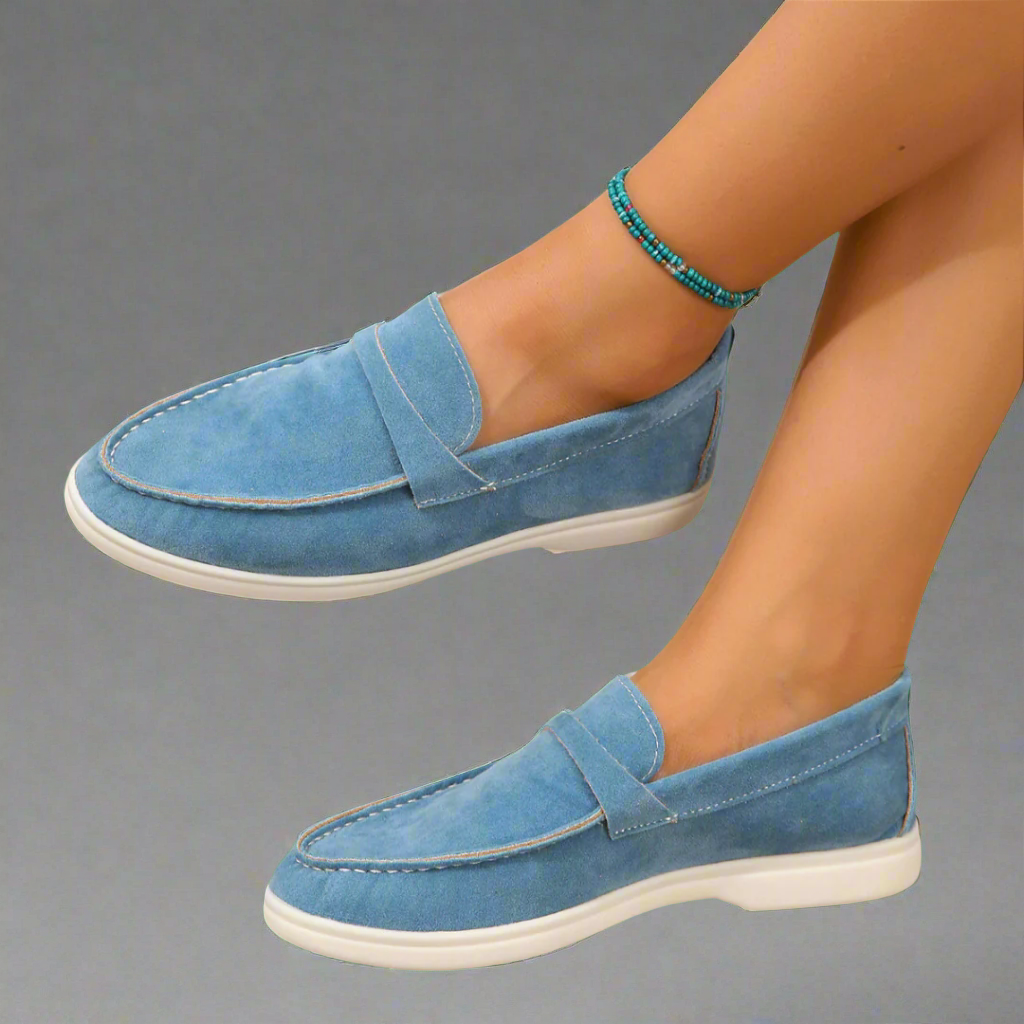 Classic slip-on loafers with smooth finish and streamlined silhouette