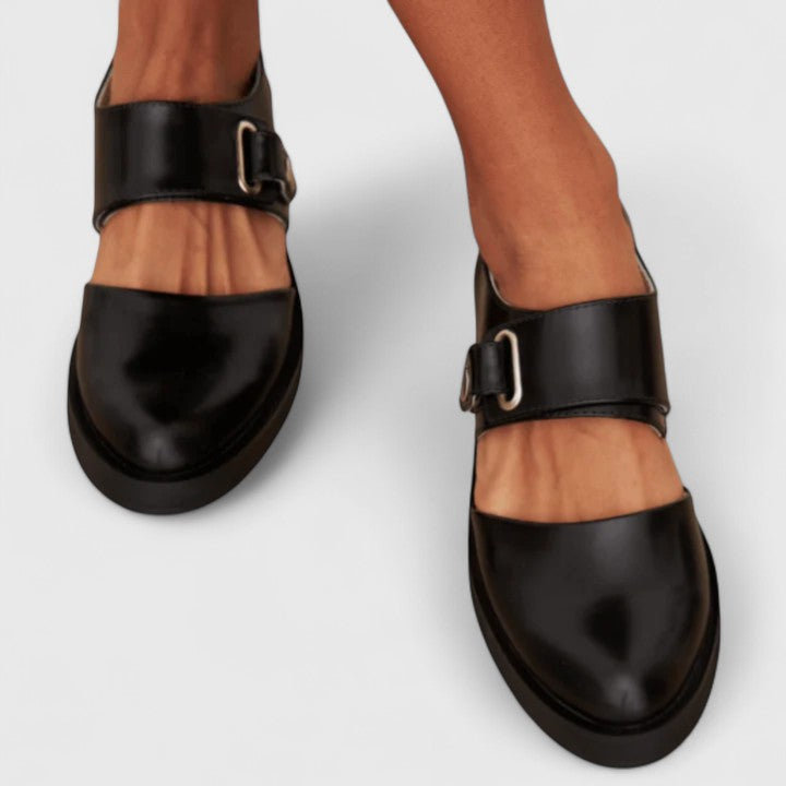 Elegant black heeled shoes named Darcy with a sleek, refined silhouette
