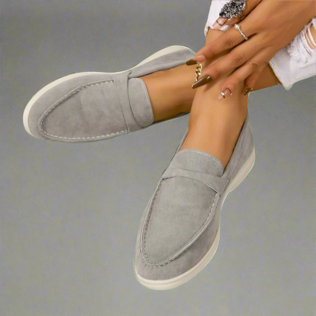 Classic slip-on loafers with smooth finish and streamlined silhouette