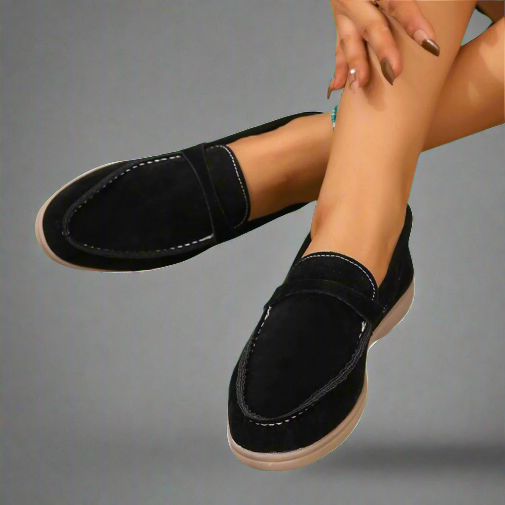 Classic slip-on loafers with smooth finish and streamlined silhouette
