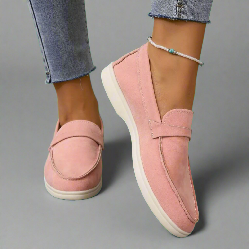Classic slip-on loafers with smooth finish and streamlined silhouette
