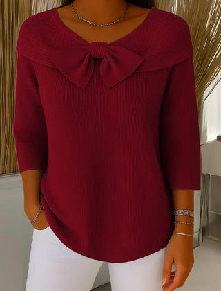 Women’s ribbed round-neck sweater with a fixed bow detail and three-quarter sleeves