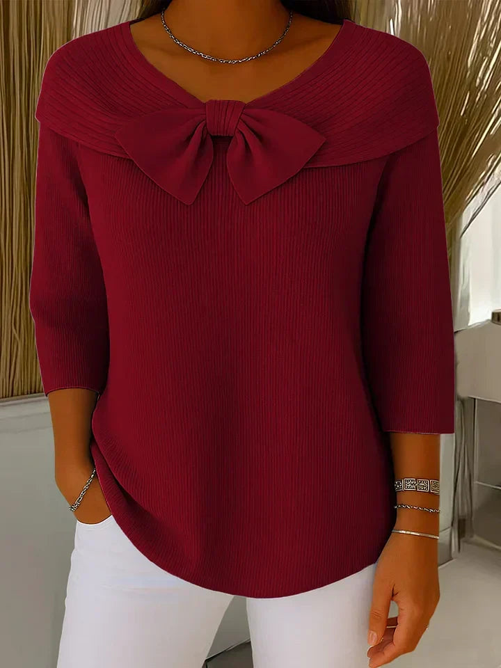 Women’s ribbed round-neck sweater with a fixed bow detail and three-quarter sleeves