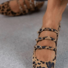 Leopard print flats with triple-buckle detail and a soft cushioned sole