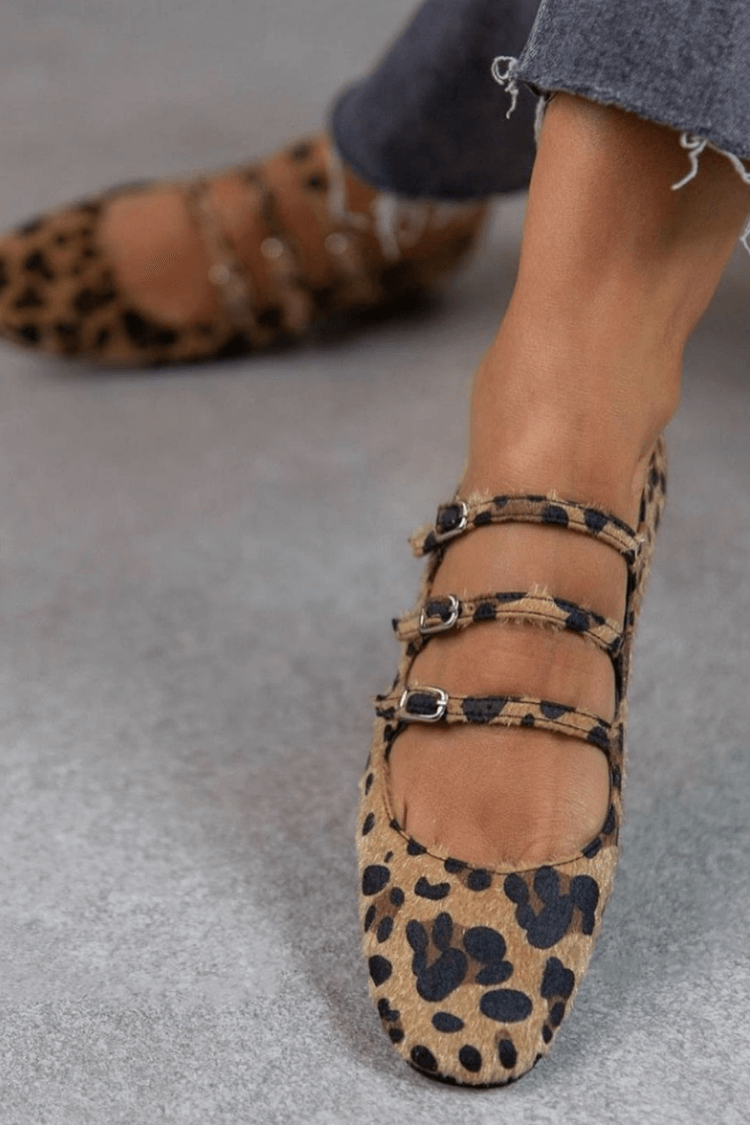 Leopard print flats with triple-buckle detail and a soft cushioned sole
