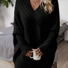 Oversized V-neck sweater with batwing sleeves and asymmetrical wrap hem in khaki and black