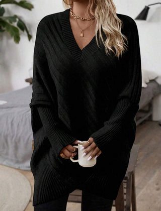 Oversized V-neck sweater with batwing sleeves and asymmetrical wrap hem in khaki and black