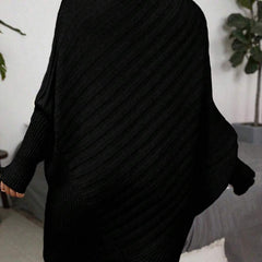 Oversized V-neck sweater with batwing sleeves and asymmetrical wrap hem in khaki and black