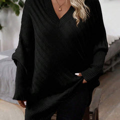Oversized V-neck sweater with batwing sleeves and asymmetrical wrap hem in khaki and black