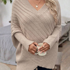 Oversized V-neck sweater with batwing sleeves and asymmetrical wrap hem in khaki and black
