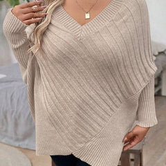 Oversized V-neck sweater with batwing sleeves and asymmetrical wrap hem in khaki and black