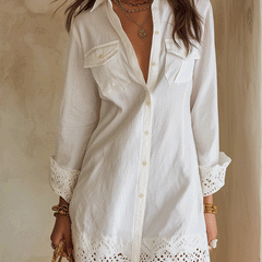 White bohemian shirt mini dress with collared neckline, button front and embroidered eyelet scalloped hem