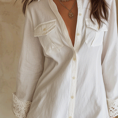 White bohemian shirt mini dress with collared neckline, button front and embroidered eyelet scalloped hem