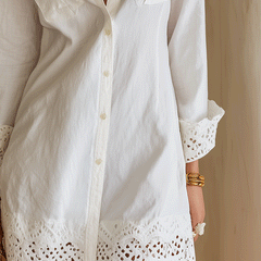 White bohemian shirt mini dress with collared neckline, button front and embroidered eyelet scalloped hem