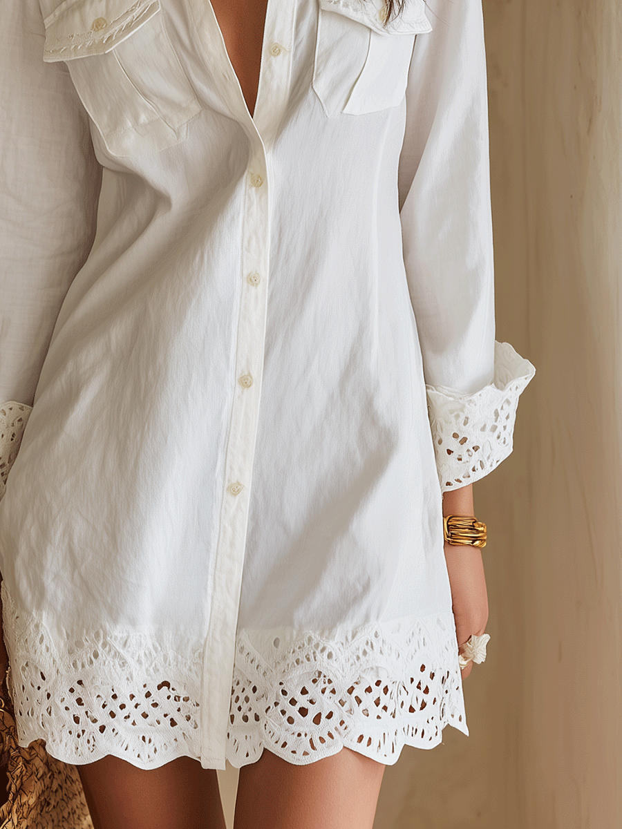 White bohemian shirt mini dress with collared neckline, button front and embroidered eyelet scalloped hem