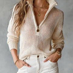 Woman wearing a loose-fit half-zip collar long-sleeve knit sweater