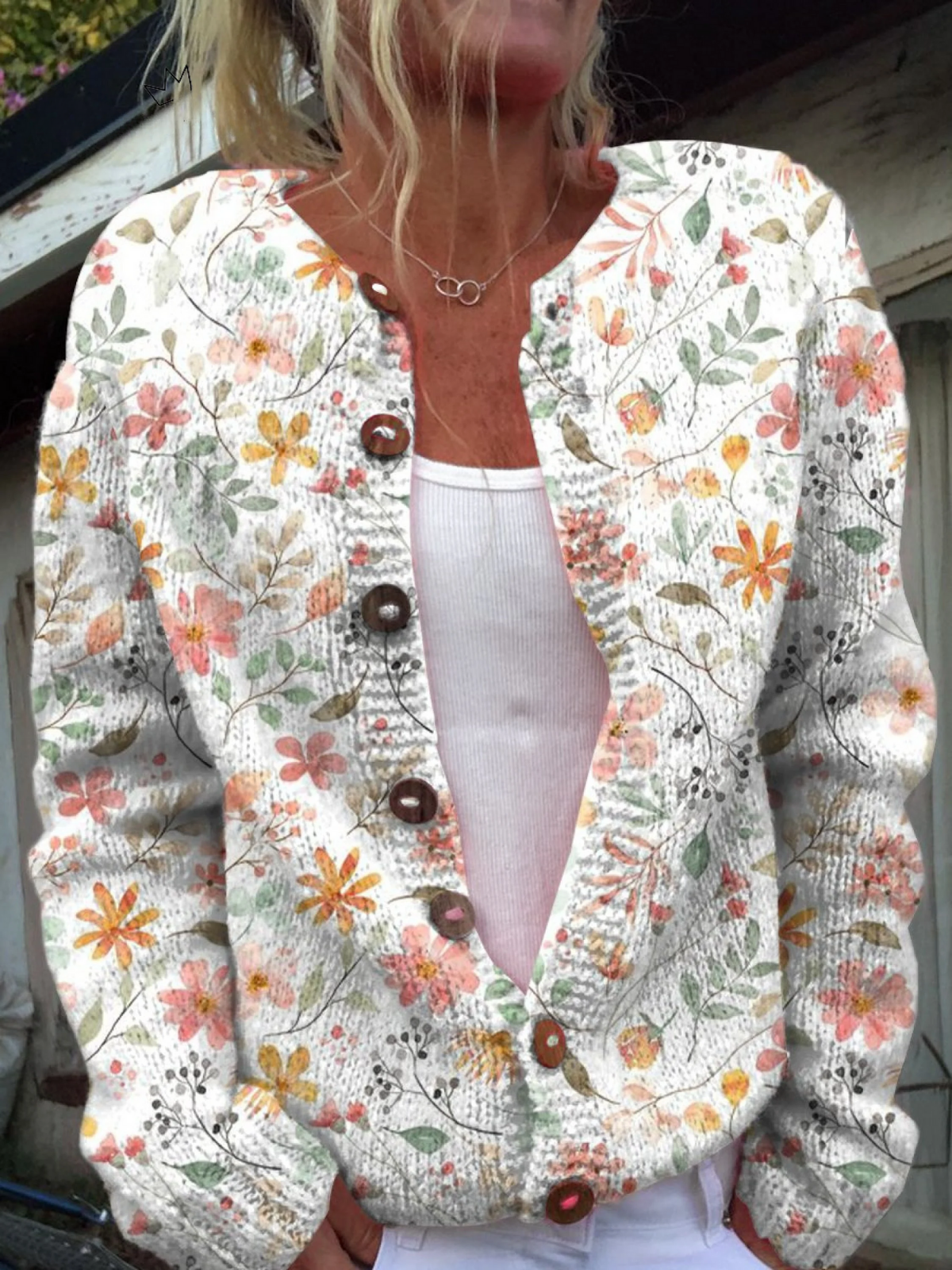 Greta open-front floral knit cardigan in blush, peach, gold and sage with wood-tone buttons