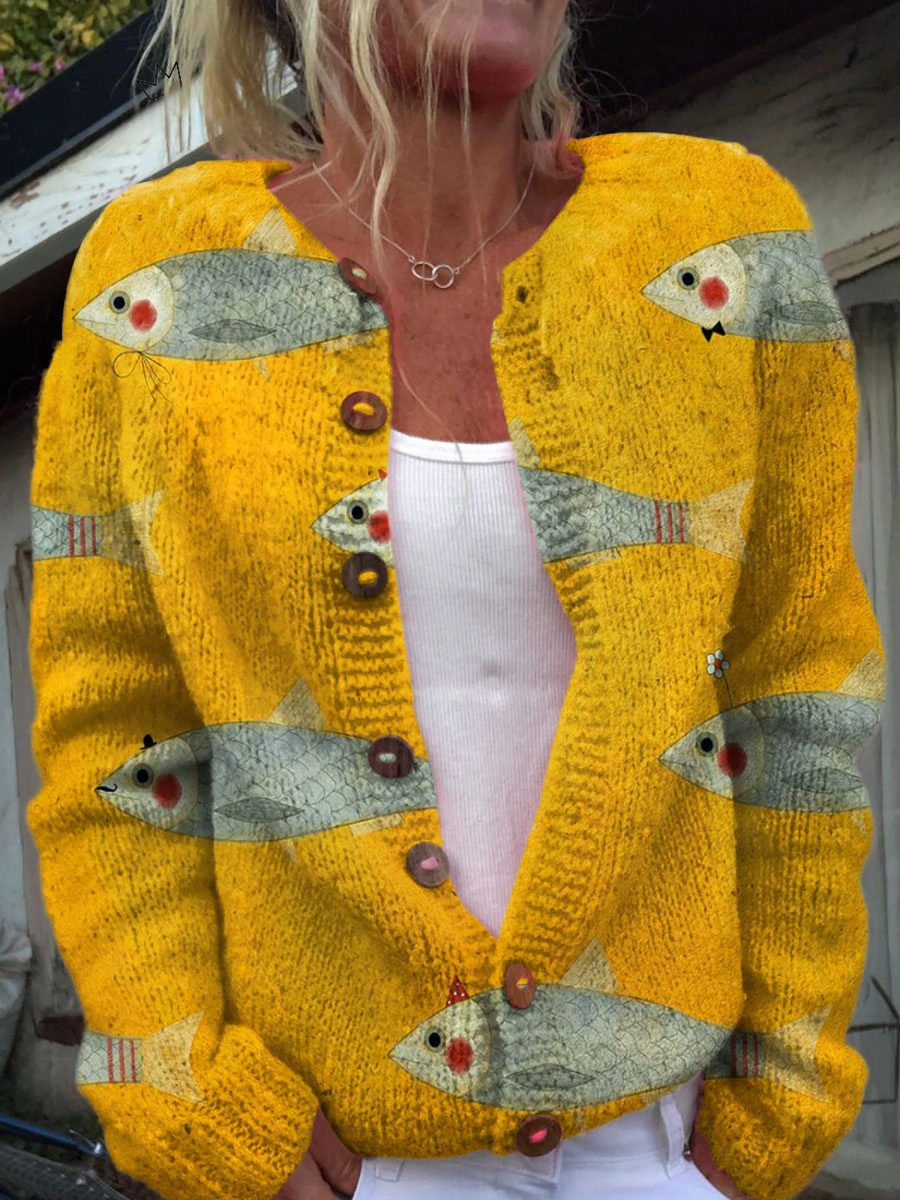 Golden-yellow open-front knit cardigan with whimsical fish print and round buttons