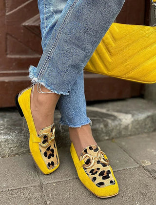 Yellow slip-on loafer with animal print tip and golden ring detail