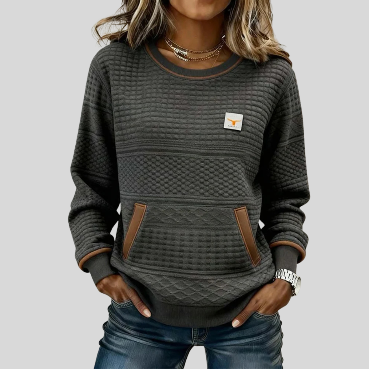 Women's crew neck colorblock sweatshirt with quilted texture panels and front kangaroo pocket