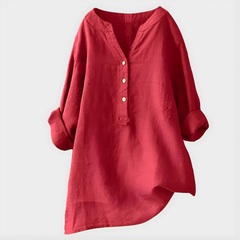 Woman wearing a relaxed cotton-linen V-neck blouse with soft draping