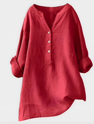 Woman wearing a relaxed cotton-linen V-neck blouse with soft draping