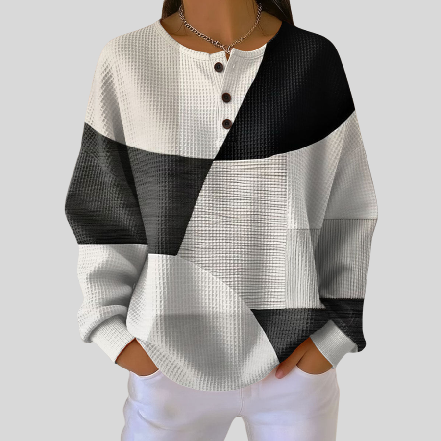 Waffle knit henley sweatshirt with black-and-white geometric print and button placket
