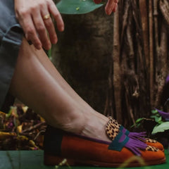 Brown animal print loafers with decorative fringes for women