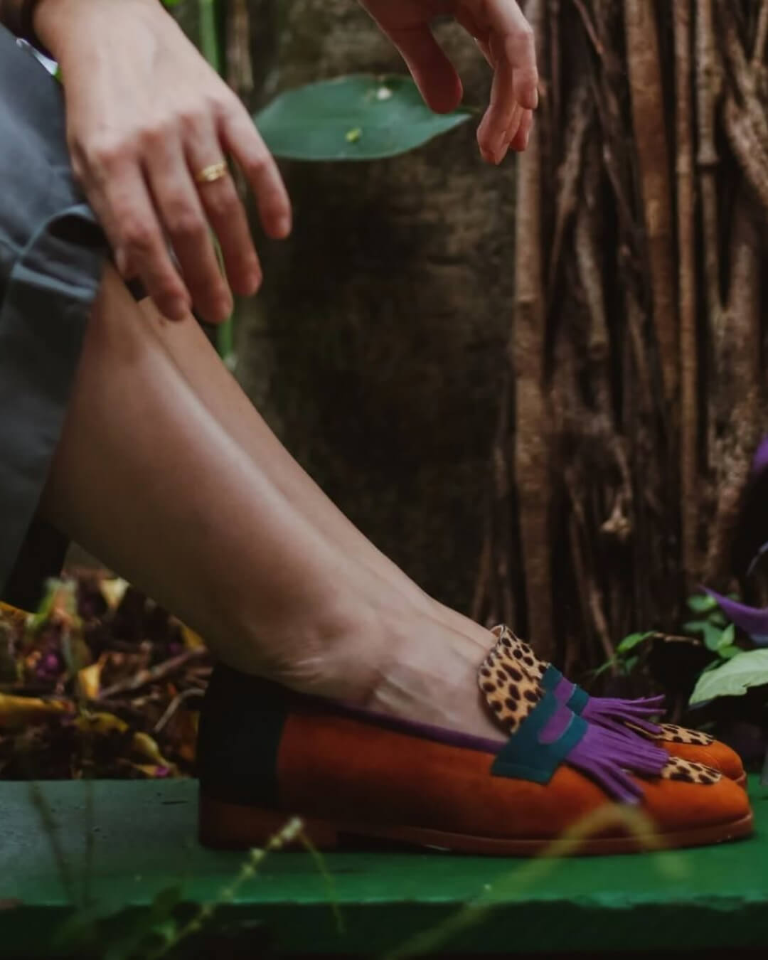 Brown animal print loafers with decorative fringes for women