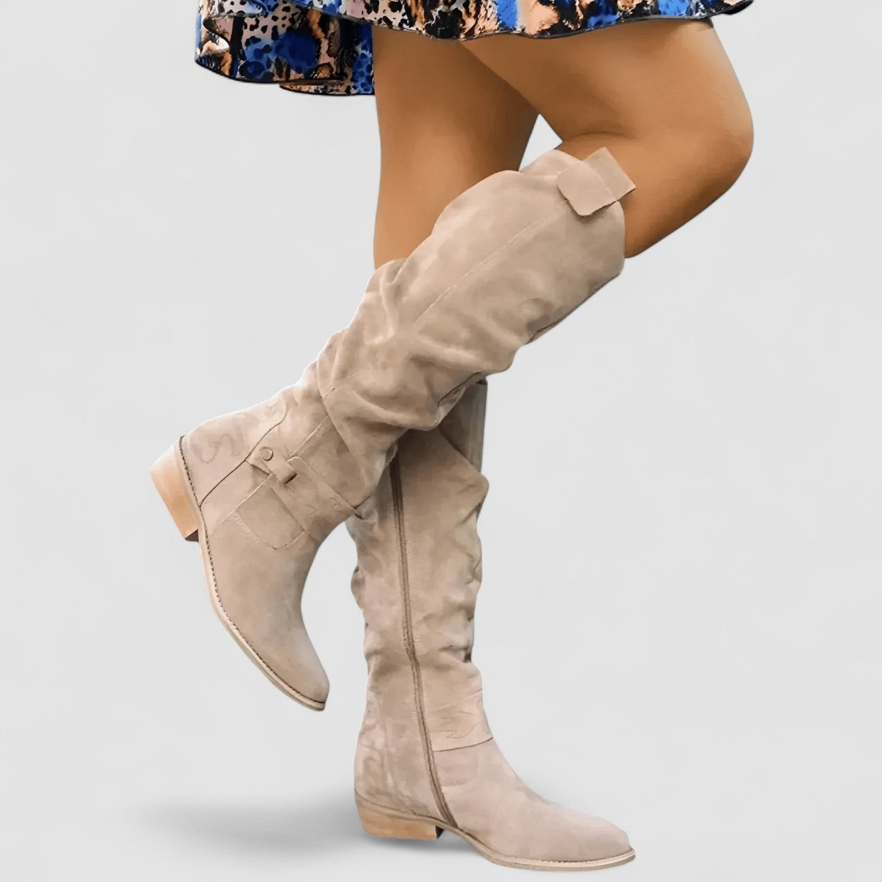 Slouch knee-high riding boots with ankle buckle strap and low block heel