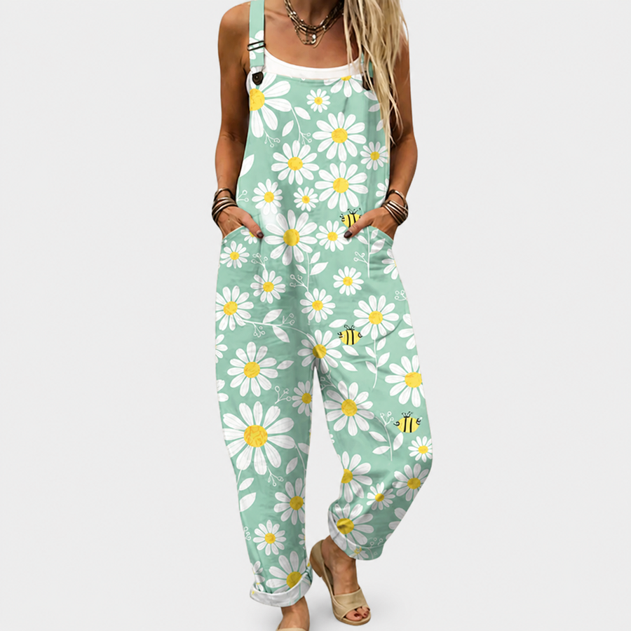 Woman wearing printed wide-leg overalls with adjustable straps