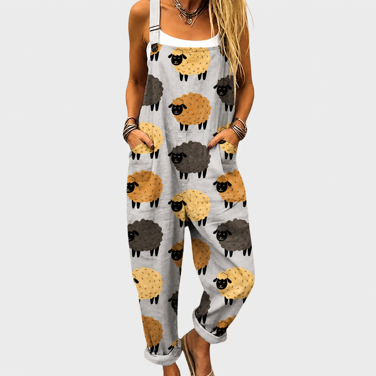 Woman wearing printed wide-leg overalls with adjustable straps