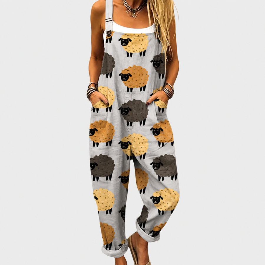 Woman wearing printed wide-leg overalls with adjustable straps