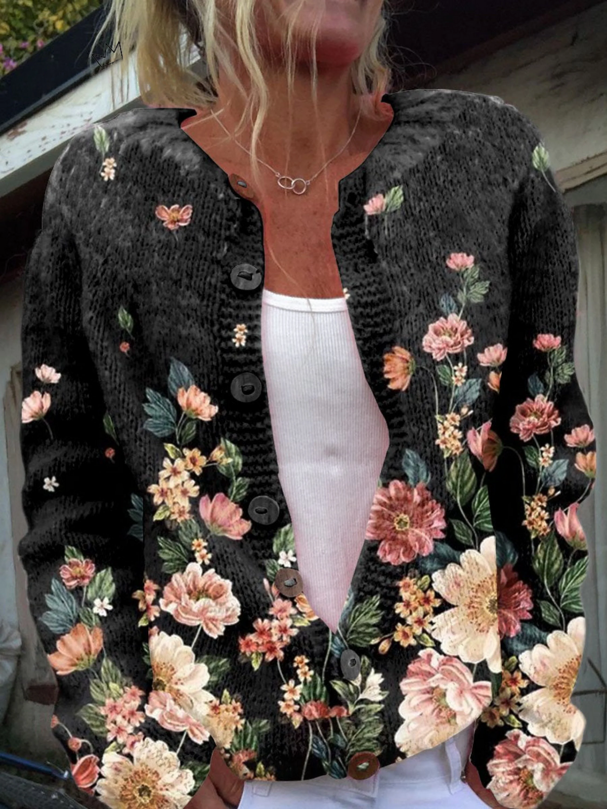 Women's open-front cardigan in a black vintage floral print with soft pinks, creams and sage greens.