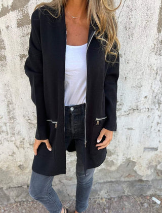 Women's hooded long sleeve open-front cardigan shown in a soft everyday style
