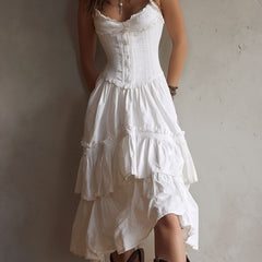 Boho corset midi dress with tiered skirt and delicate lace trim at the neckline