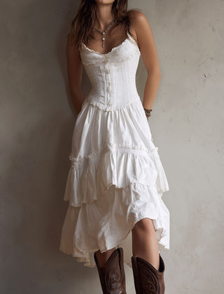 Boho corset midi dress with tiered skirt and delicate lace trim at the neckline